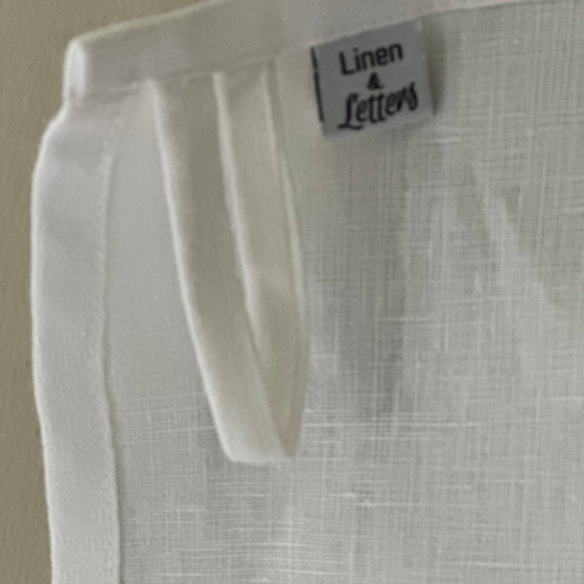 https://linenandletters.com/cdn/shop/products/ruffle-linen-kitchen-towel-with-custom-embroidered-text-817003.jpg?v=1696777646&width=1445