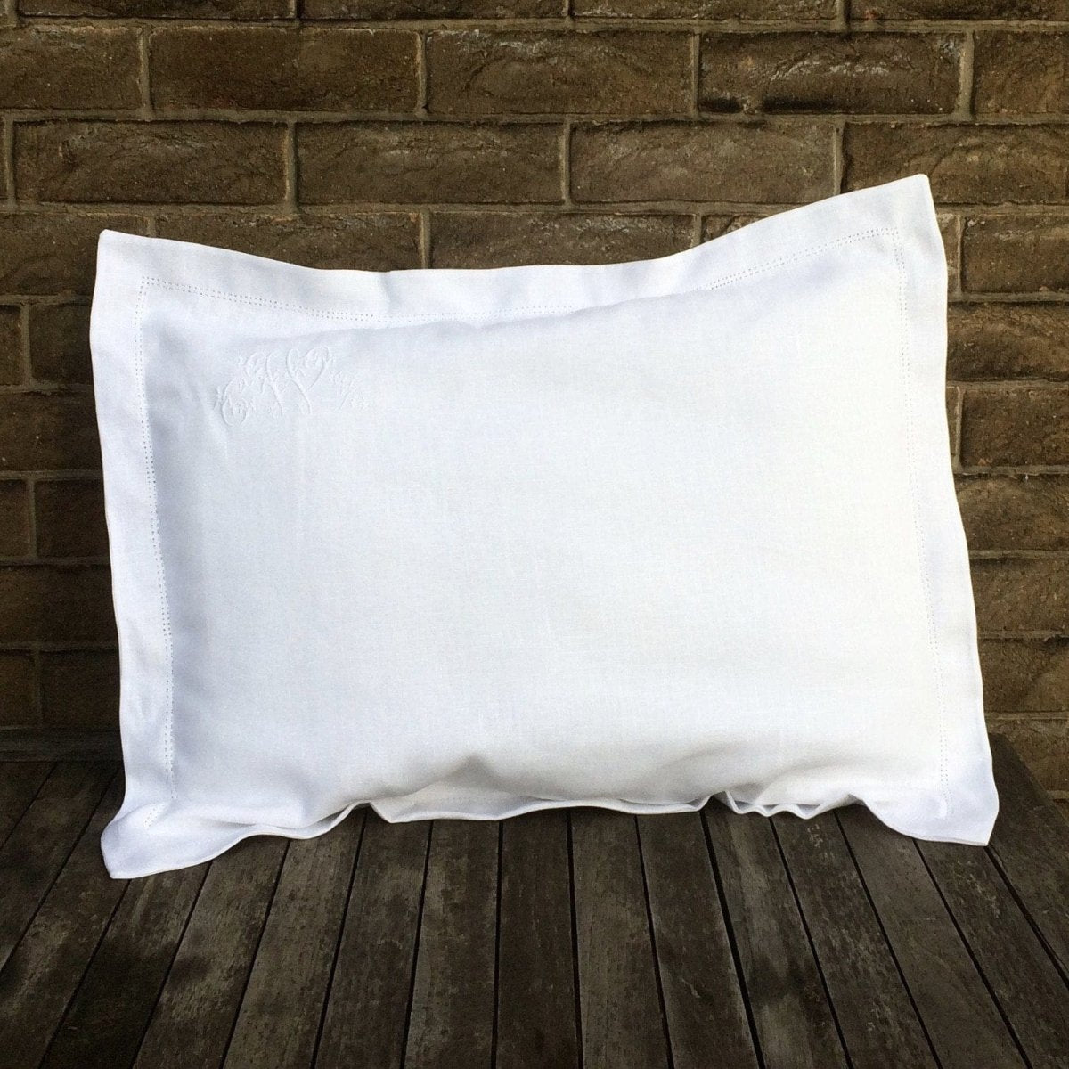 Embroidered linen pillow clearance cases